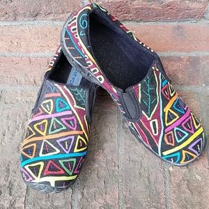 Unique rainbow geometric fabric slip ons